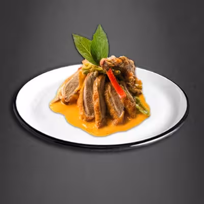 knuspriger ente roter Currysauce Kokosmisch nach scharf